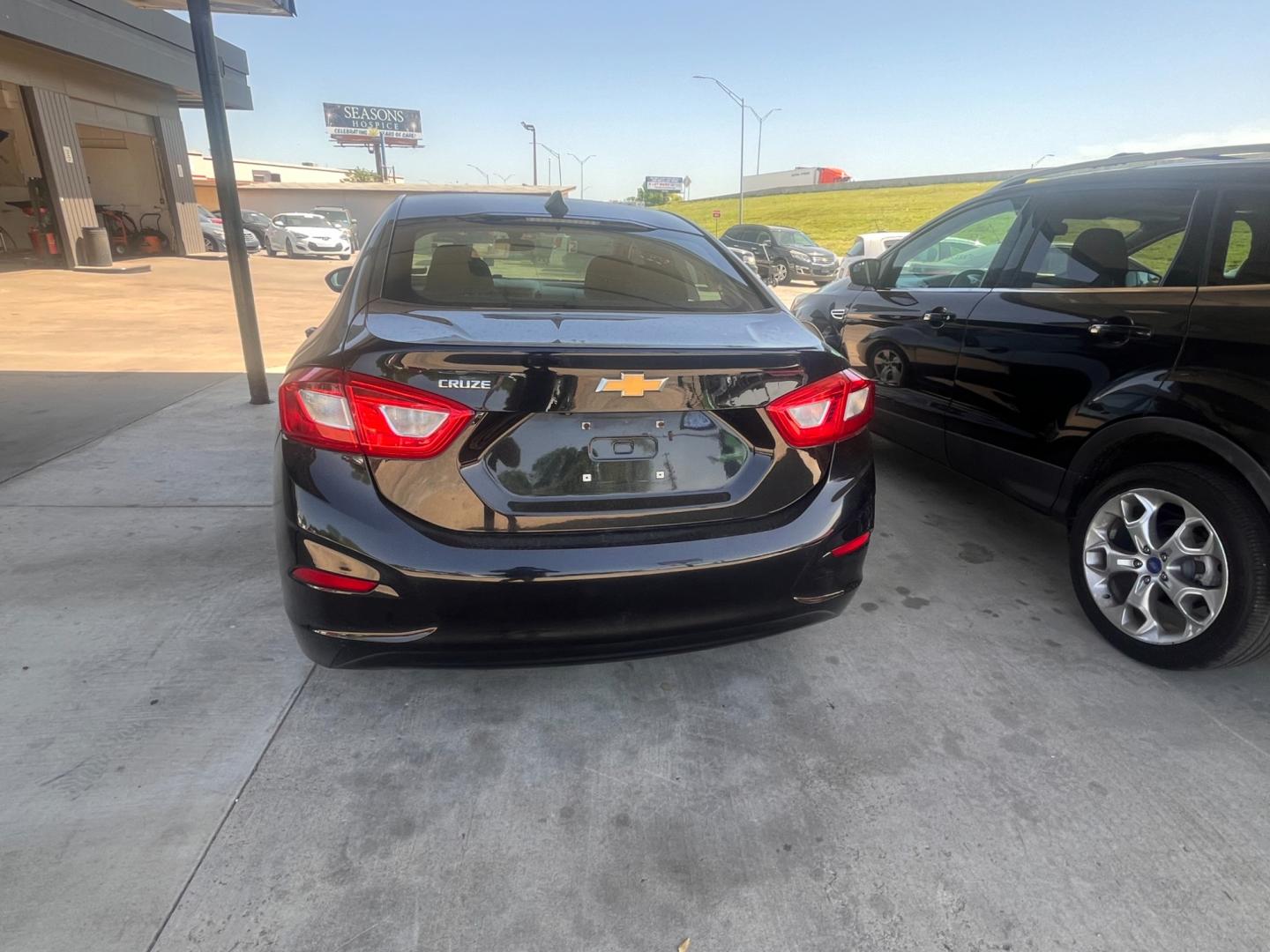 2017 BLACK CHEVROLET CRUZE LS LS Auto (1G1BC5SM1H7) with an 1.4L L4 DOHC 16V TURBO engine, 6A transmission, located at 8101 E. Skelly Dr., Tulsa, OK, 74129, (918) 592-3593, 36.121891, -95.888802 - Photo#3